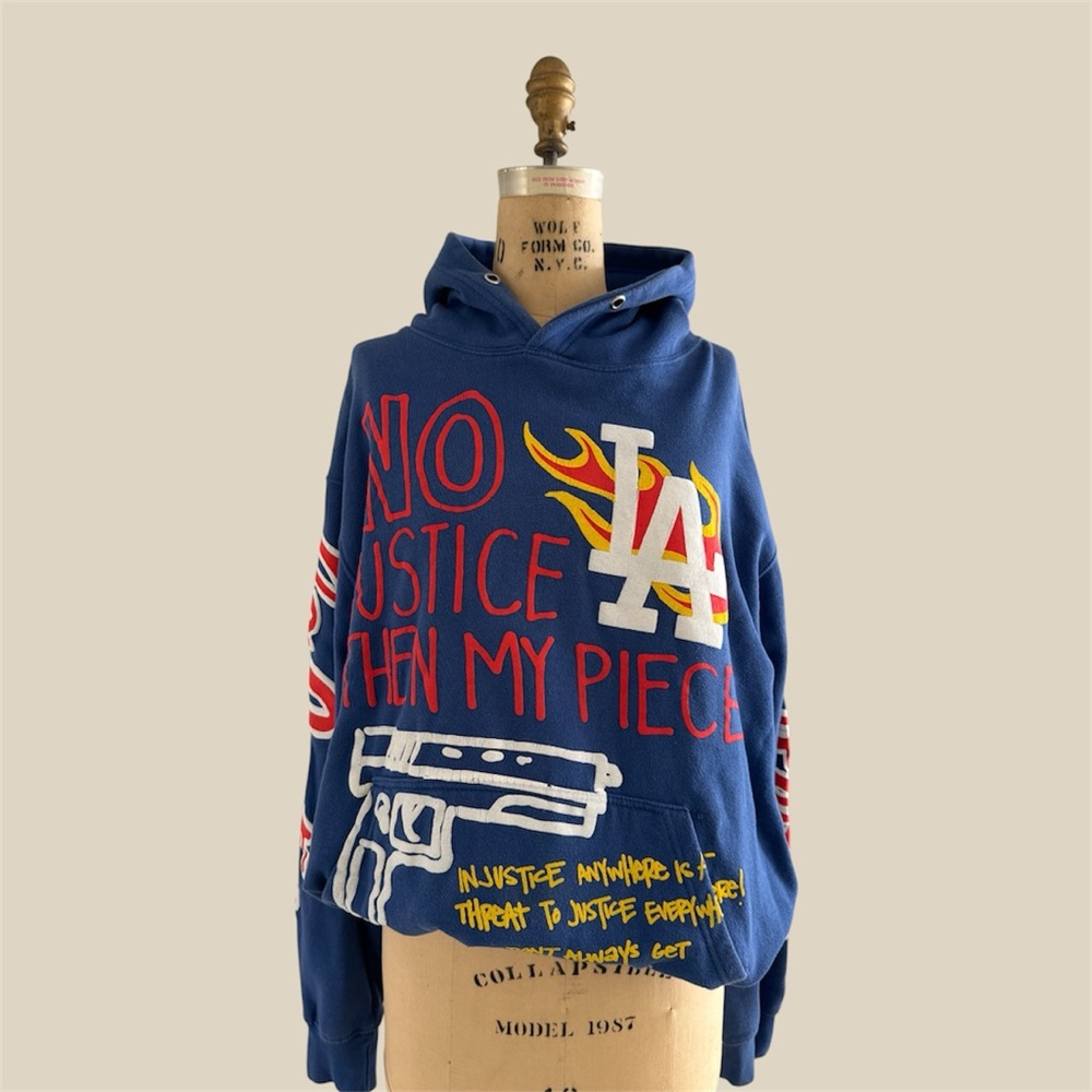 Blue Graphic Hoodie with Red and Yellow Accents